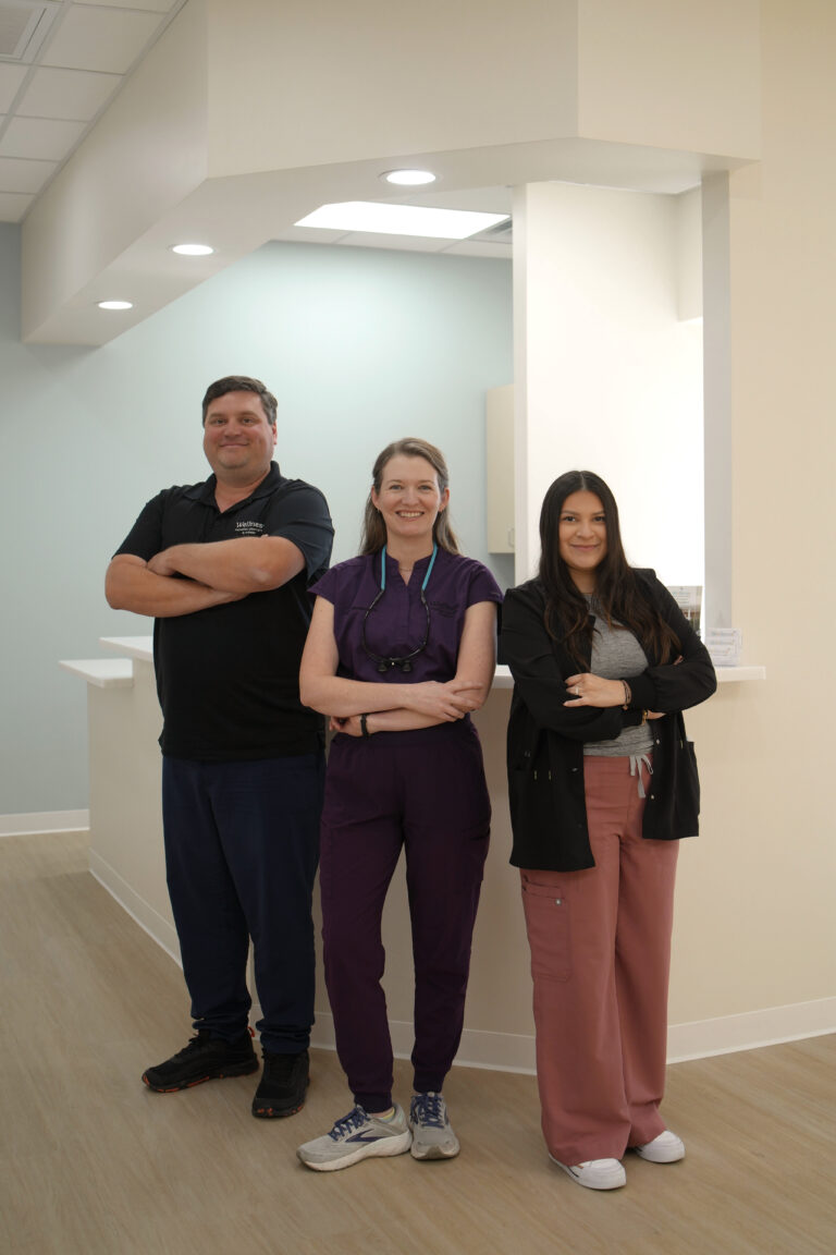 Wellness Pediatric Dentistry team in the bright, modern office space