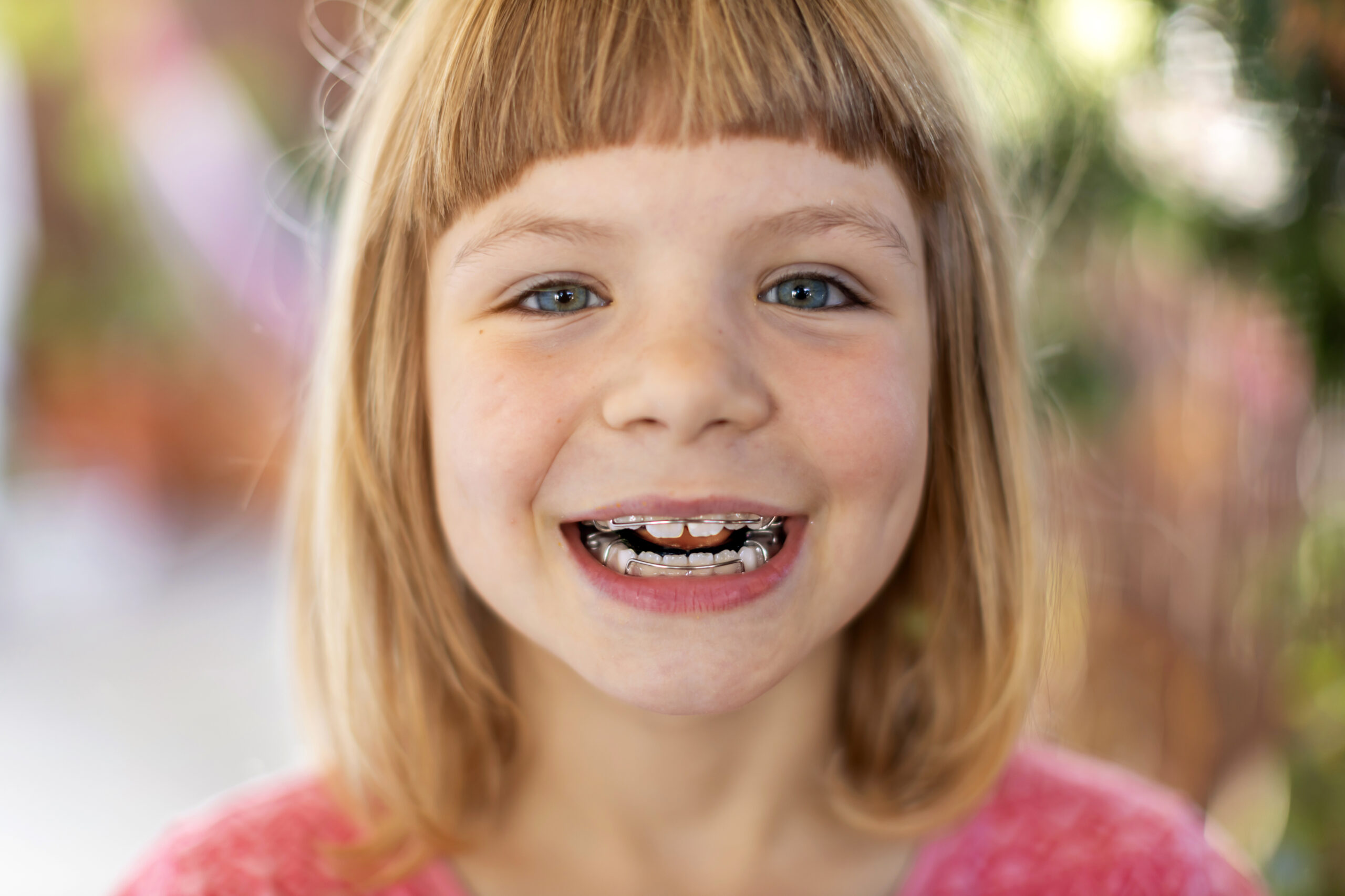 Portrait of smiling little girl with braces